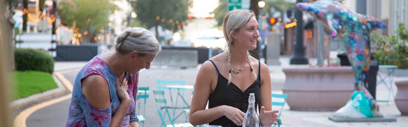 Elizabeth McLuskey and her mom Patti play during Juno Vibranz’s Drag Bingo night outside of Pour Yours Wine Bar in downtown Clearwater. 