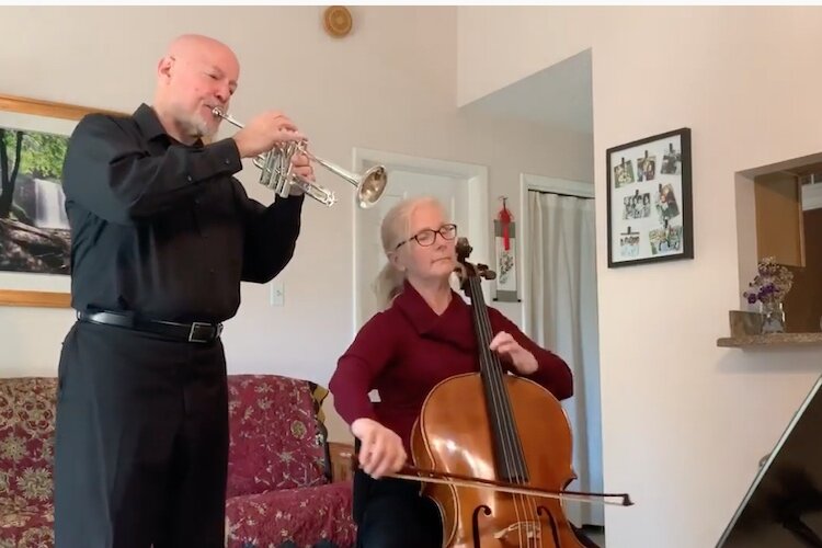 Robert Smith, principal trumpet, and Laura McKey Smith, cello, of The Florida Orchestra at home in the time of coronavirus.