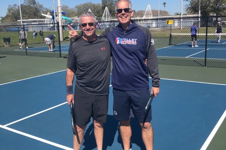 Allan Dawson and Dave Pitts on the pickleball court.