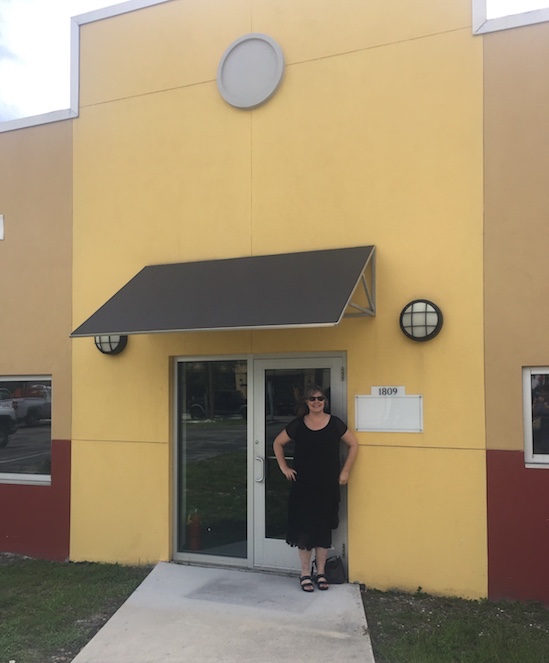 Owner Stefani Beddingfield at new storefront for Inkwood Books.