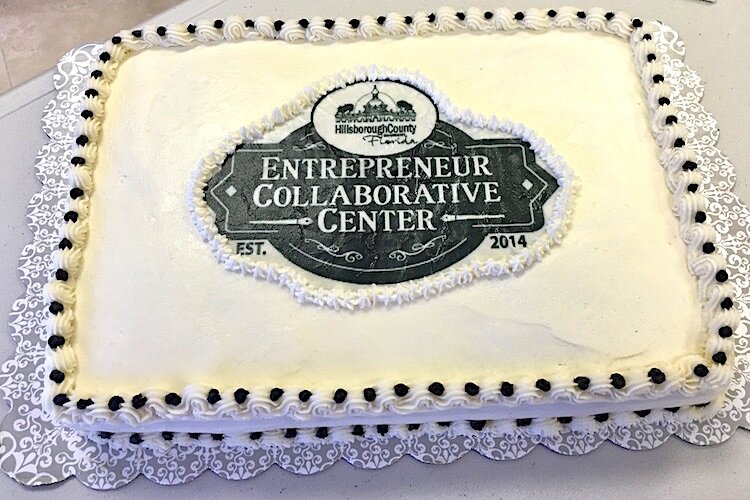 A celebratory cake marks the creation of the ECC in 2014.