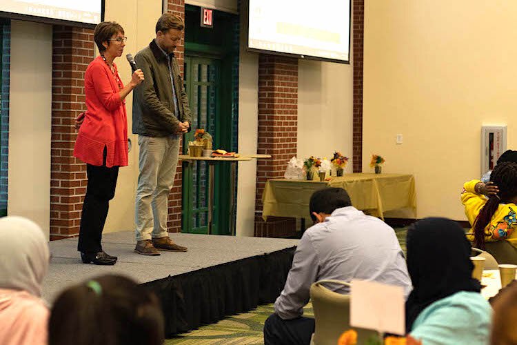 Pastors Sally Campbell-Evans of Hyde Park’s United Methodist Church and Will Wellman of Palma Ceia Presyberian lead the Tampa Bay Refugee Task Force and guests in prayer.