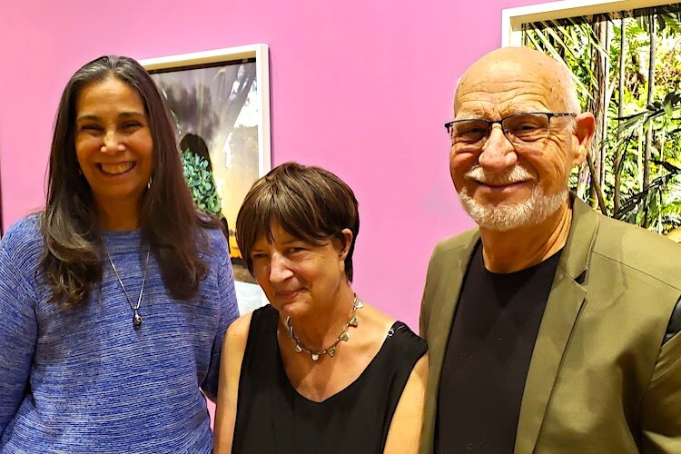 Artists Carole Mickett and Robert Stackhouse catch up with Noel Smith, Deputy Director of USF CAM/Curator, Latin American & Caribbean Art (center). Mickett and Stackhouse are featured in 'As the Gulf Turns' at HCC-Ybor, Feb. 6-March 20.
