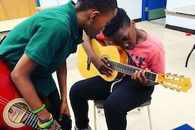 The student becomes the teacher; after 8-9 weeks, children become mentors for new music students.