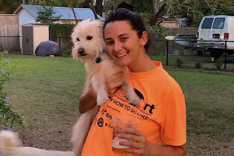 Haley and her dog Rizzo.