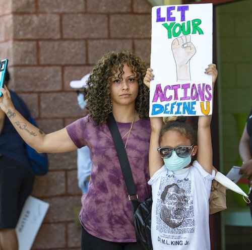 Amber West, 37, and her daughter, Allyana, 7, of Tampa, felt an urgency to speak up. "I want her to defend what's right," Amber says.