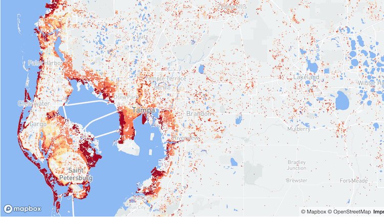 Darker red areas show greatest flood risk on this Mapbox graphic captured by Google Screengrab.