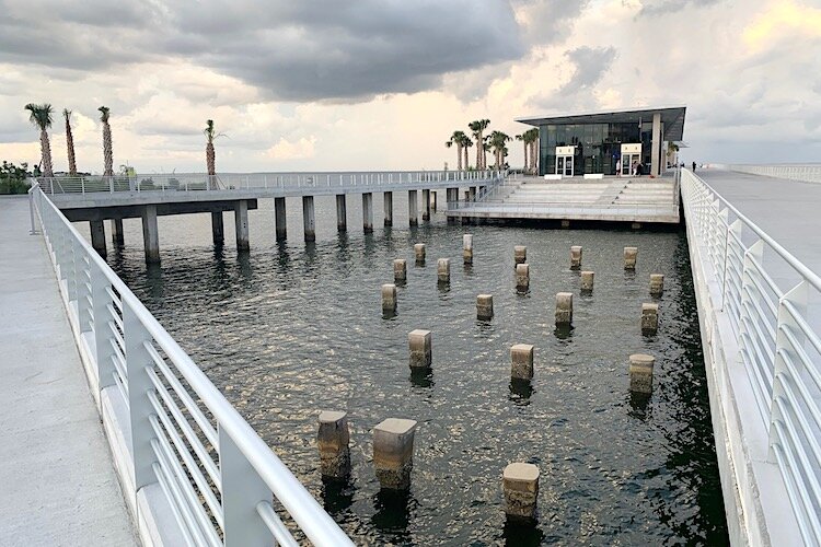 Pilings from the old pier stand as testament to what once was next to the Tampa Bay Watch Discovery Center.