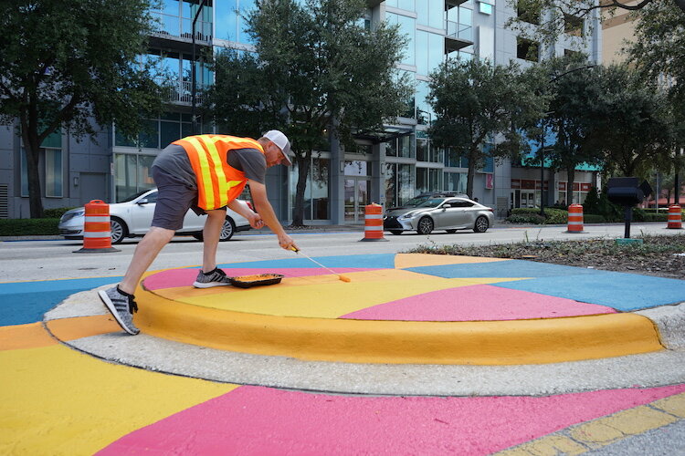 Murals tend to calm traffic while enhancing everyone's enjoyment of the street scene.