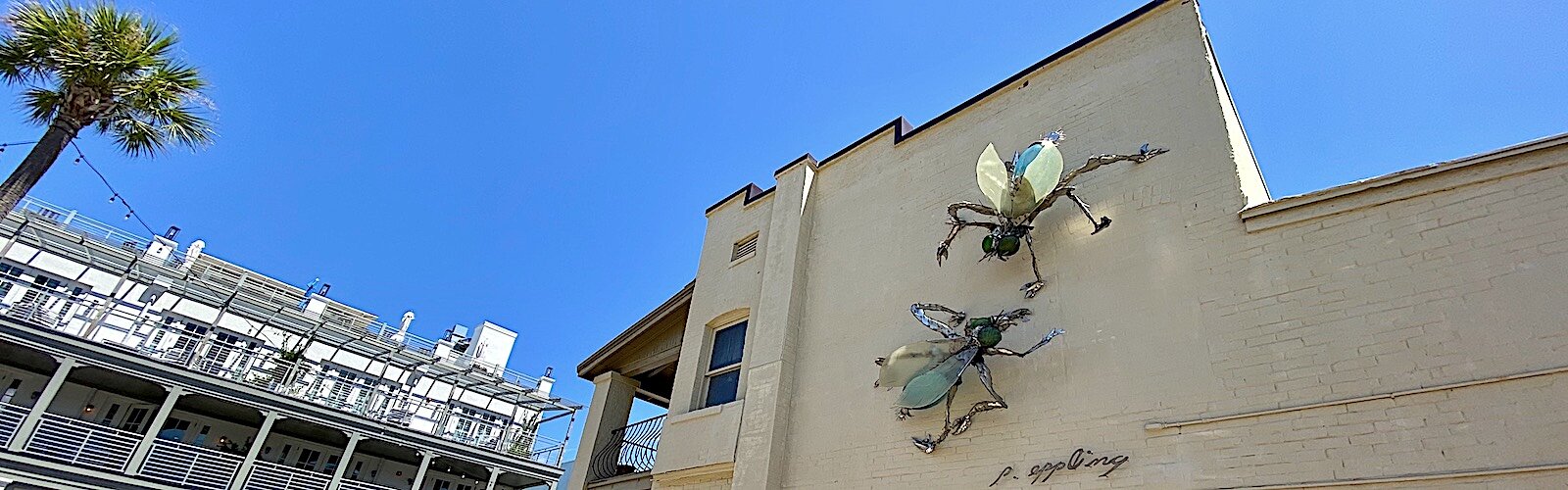 A pair of flies by Sculptor Paul Eppling along 8th Avenue in Pass-A-Grille in Pinellas County.