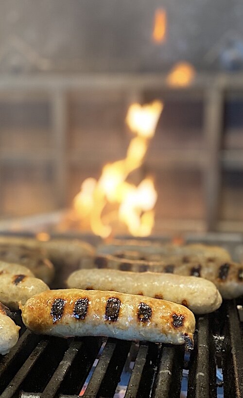 Grilled sausage featured on the menu at Casa Santo Stefano.