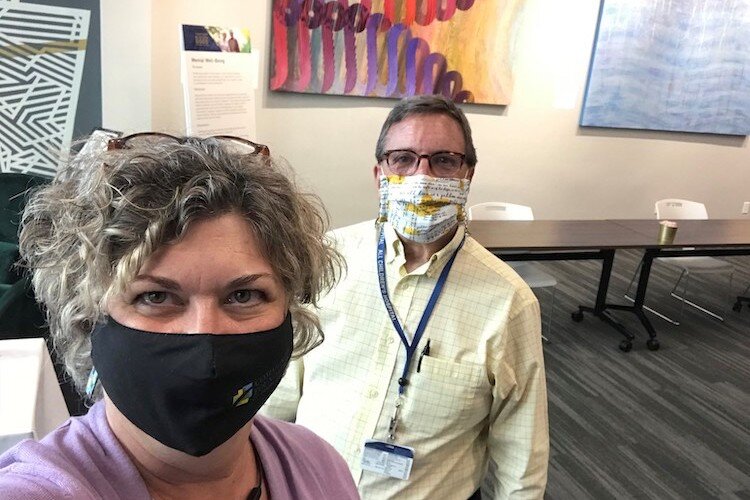 VP for Community Connections Wilma Norton and Roy Adams of Johns Hopkins All Children's Hospital at the new Community Foundation office in St. Pete.