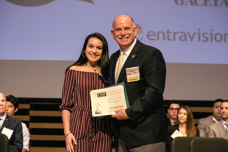 Latino Scholar Evelyn Cueves Campos and Sponsor Richard Gonzmart of the Columbia Restaurant Group.