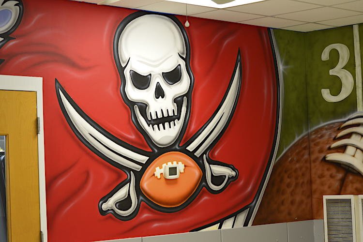 Volunteers from the Bucs and Jabil fixed up community centers in low-income neighborhoods.