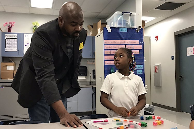 THAP CEO Derrick Blue volunteers at Potter Elementary in East Tampa.