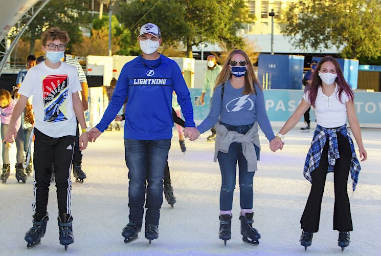 The Zina family of Largo (son A.J., 13, dad Adam, mom Heather, and daughter Faith, 14) spend an afternoon at Winter Village's 5,000-square-foot ice skating rink.