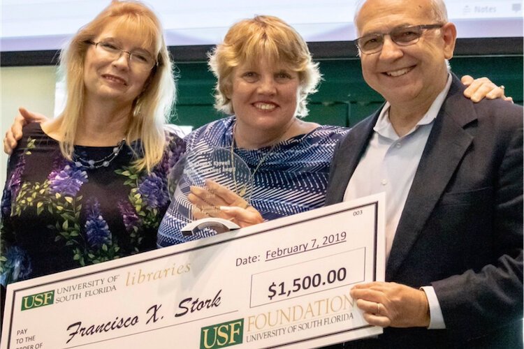 Donna Heath (Books Save Lives co-chair), Dr. Joan F. Kaywell (Books Save Lives namesake), and Francisco Stork (Young Adult Literature author and 2019 Books Save Lives award recipient).