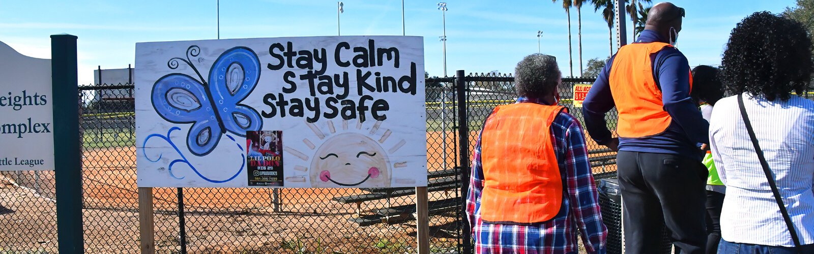 Designed by the East Tampa CRA to encourage vision and thoughtful discussion, a walking tour moves past the Belmont Heights Baseball Complex and an artistic billboard in January 2021.