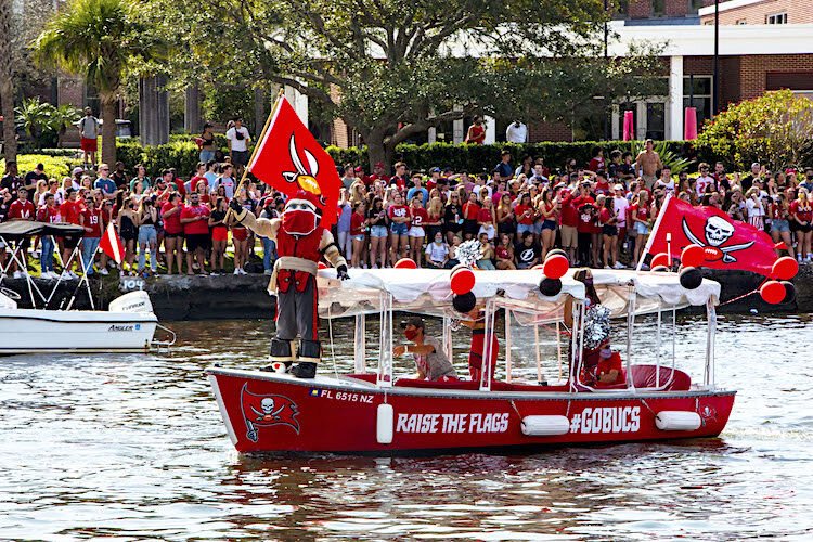 Tampa Bay Buccaneer Mascot "Captain Fear" waves a Bucs' flag during the boat parade.