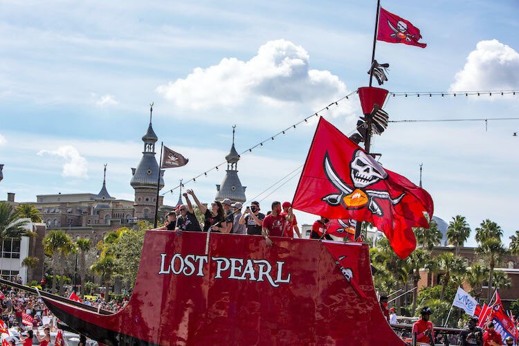 The "Lost Pearl" navigates along the Hillsborough River parade route with dozens of watercraft of all kinds.