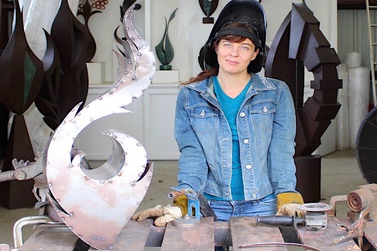 Dominice Gilbert, a juried Gasparilla artist who lives and works in St. Pete, in her sculpture studio.