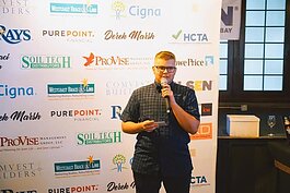 Andy Klumb talks about his personal journey at a fundraiser for GLSEN Tampa Bay.