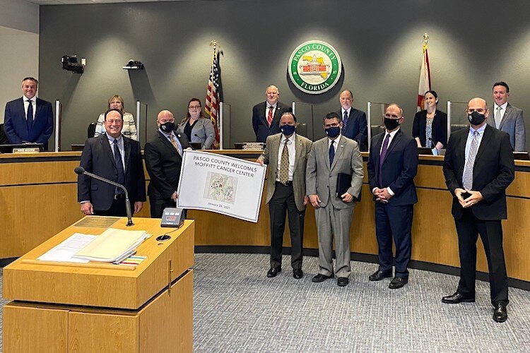 Pasco County Commissioners and Moffitt leaders celebrate the cancer center’s growth.