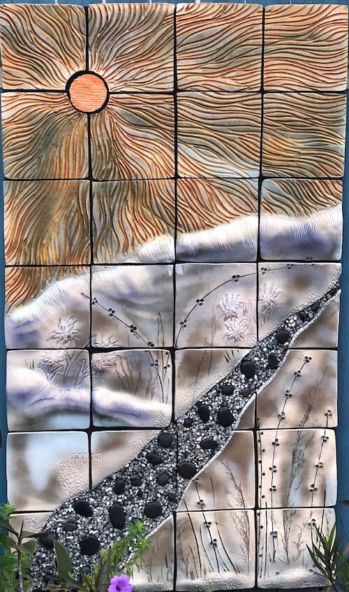 Brenda McMahon, “A New Dawn”  ceramic wall decoration, 50"x 28,” value $3,000