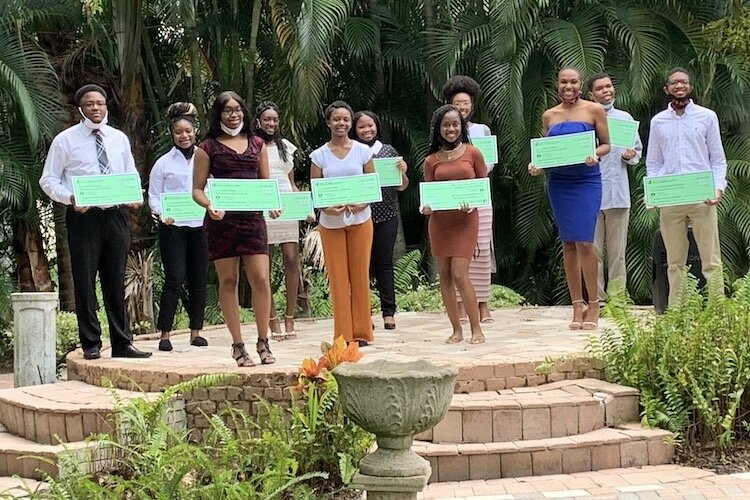 Woodson Warriors Scholarship recipients:  (l to r) Daniel Sanders, Diamond Scrivens, Kaila Priester, Tori Roberts, Aniyah Willis, Lauryn Latimer, Charnecia Cummings, Amya Ellison, Zakaria White, Demetrius Williams, Chandrahasa Srinivasa