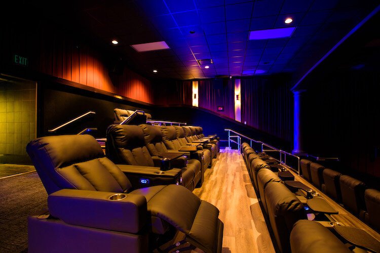 Reclining, comfy chairs inside the newly opened Grove Theater.