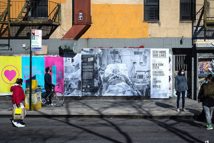Pasted photograph by Fabio Bucciarelli for the New York Times and illustration by Jeremyville on Allen Street in Manhattan. © Benjamin Petit.