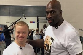 Sam Piazza meeting his hero WWE Superstar Titus O’Neil at the local YMCA.