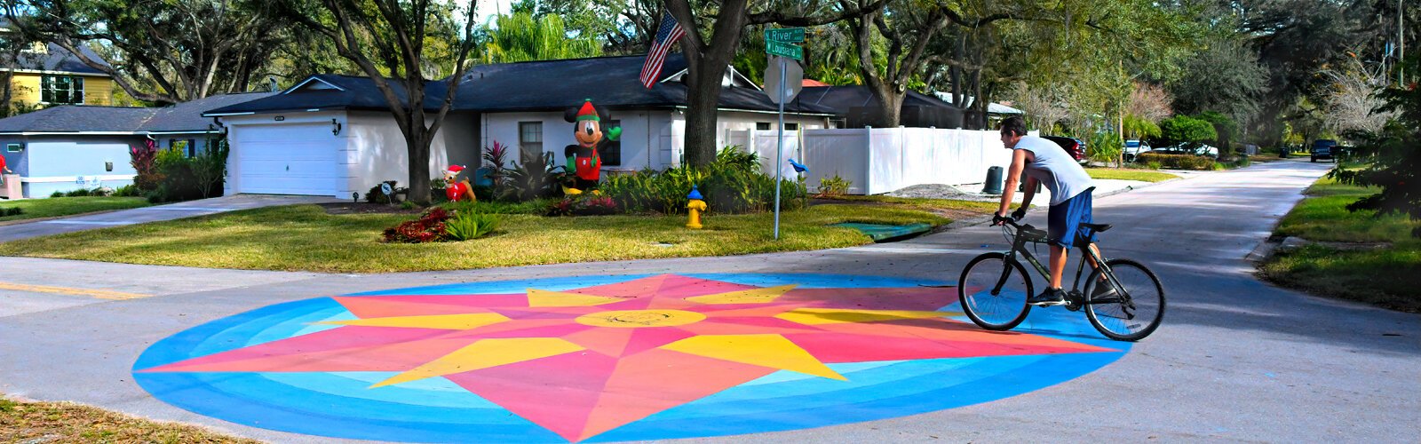 The vibrant mandala in South Seminole Heights, Tampa’s first street mural when it was painted in 2017, is gone now as FDOT crews carried out Gov. DeSantis's order targeting street art