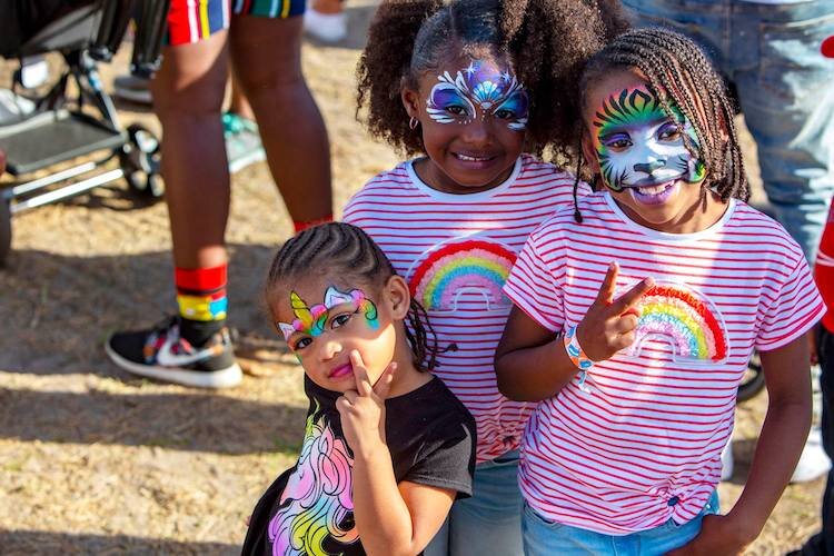 Painted faces and little girls and boys go together like strawberries and shortcake during the festival.