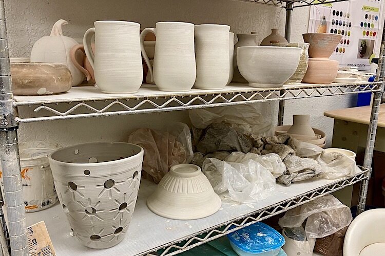 Unfired pots awaiting time in the kiln.