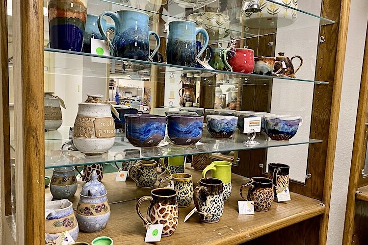 Finished pottery pieces for sale in the Carrollwood Cultural Center gift shop.