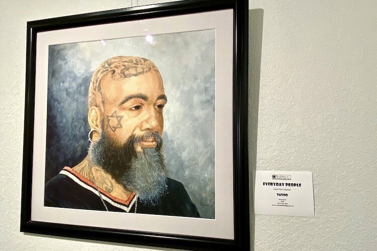 "Tattoo'' by Odell "Pat'' Mitchell on display as part of "Everyday People'' at the Carrollwood Cultural Center.