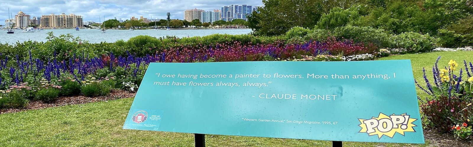 A rainbow of flowers along the waterfront at Selby Gardens sets the scene for the Roy Lichtenstein: Monet’s Garden Goes POP! exhibit.