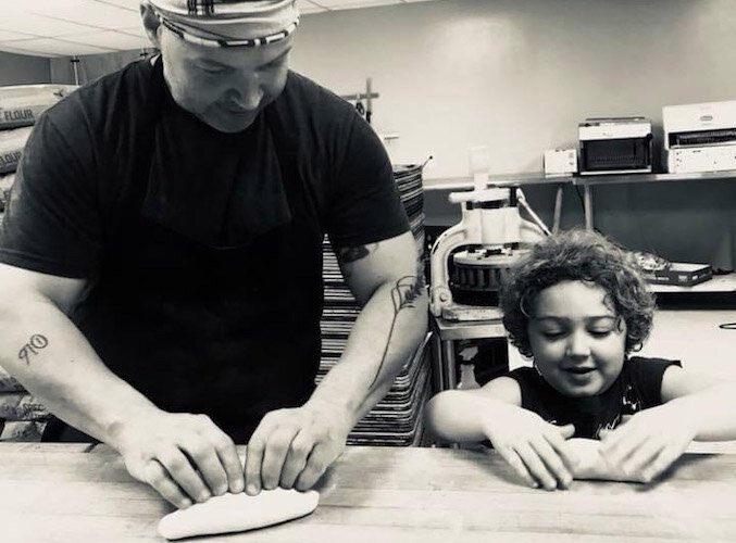 The Laukhuf boys, Jason and son Jamison, hard at work.