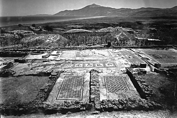 View of building excavated down to mosaic level in Antioch with Mt. Casius in the background.