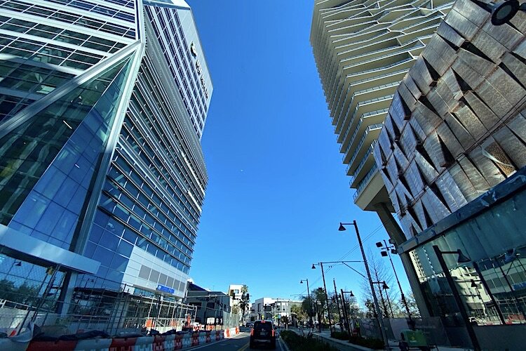 Construction continues on new apartments, hotels, offices, shops, and the USF Med School along Water Street Tampa.