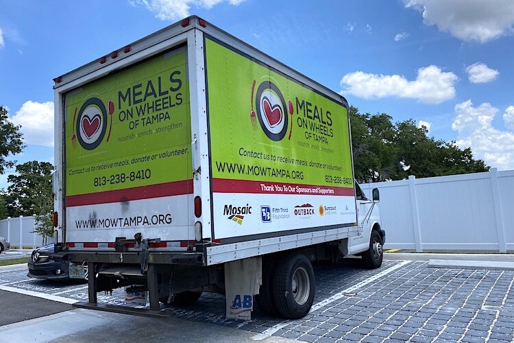 Trucks like these can be seen delivering meals to volunteers and feeding sites around Tampa.