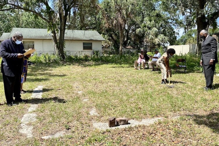 The original foundation and bricks from the historic Frederick Douglass Negro School are visible at the future park site.