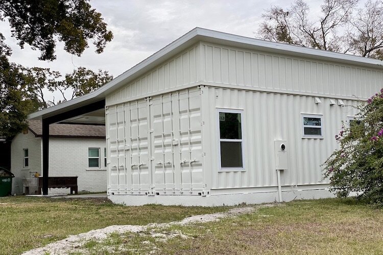 A home built out of 2 shipping containers under construction in West Tampa is an example of "Missing Middle'' housing.