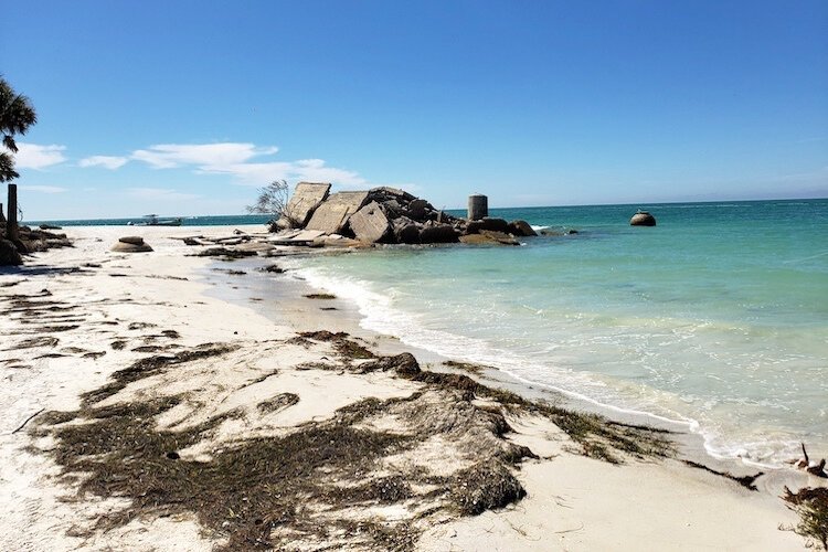 Ruins of the power plant, built circa 1919, that provided electricity for U.S. Army and Coast Guard operations at Egmont Key. Only a century after its construction, the power plant is now sinking into the Gulf of Mexico due to extensive erosion.