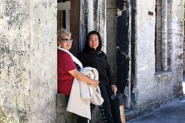 Seminole Elders Edna Bowers and Rita Youngman share a moment of contemplation at the U.S. Army's Fort Dade ruins at Egmont Key.