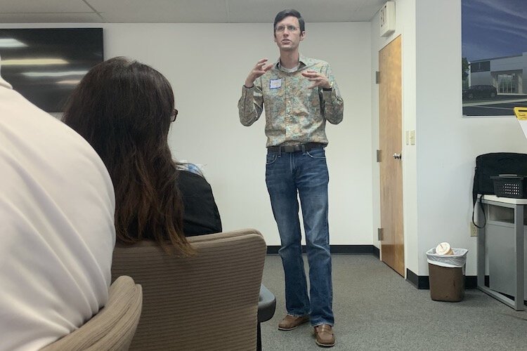 Josh Kwasnicki facilitates an off-site training session for Crisis Center of Tampa Bay employees at Parks Lincoln in Tampa.