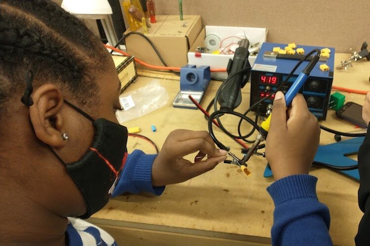 As part of AMRoC's innovation challenges, kids on one of the robotics teams have been creating tech-based solutions to improving health.