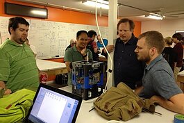 Participants at Tampa Hackerspace quickly learn the value of collaboration and sharing ideas. 