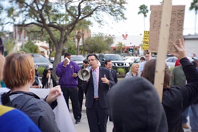 Councilman Viera speaking at a rally for Syrian refugees in 2017.